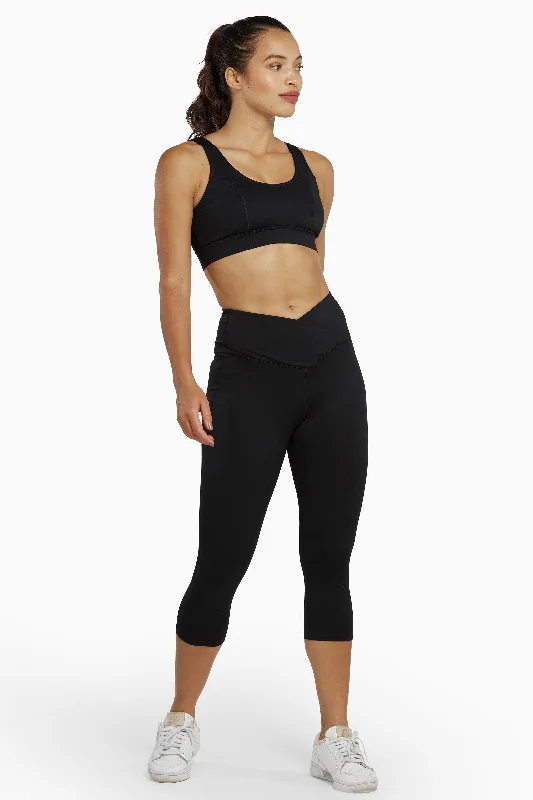 Bra with a quick - drying lining for convenience Cropped Leggings with Crossover Waistband Black Bra with a quick - drying lining for convenience Cropped Leggings with Crossover Waistband Black