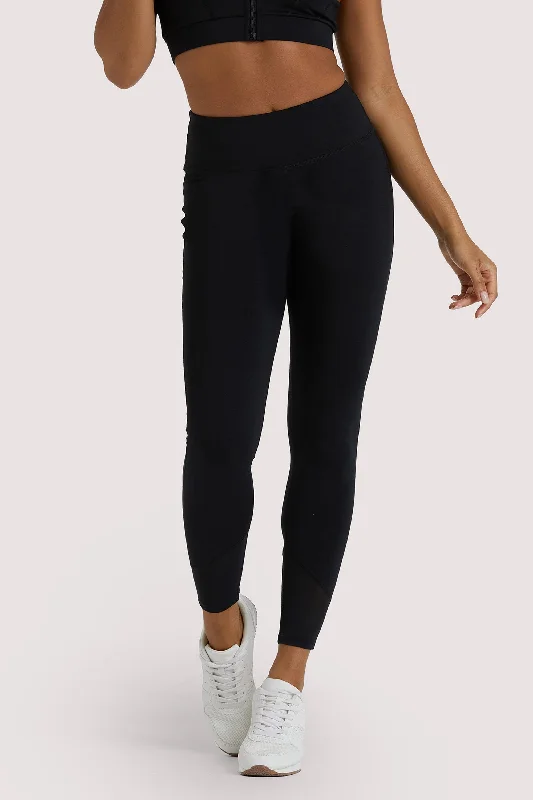 Bra with a cross - back strap design for a trendy look Eco Black Mesh Panel Leggings Bra with a cross - back strap design for a trendy look Eco Black Mesh Panel Leggings